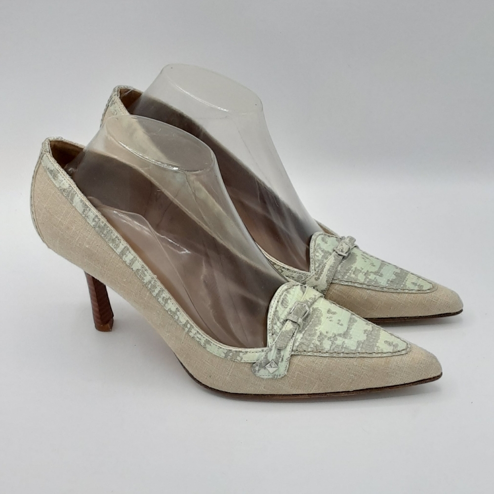 Stuart Weitzman Animal Print Leather and Canvas Pointed Toe Heels.